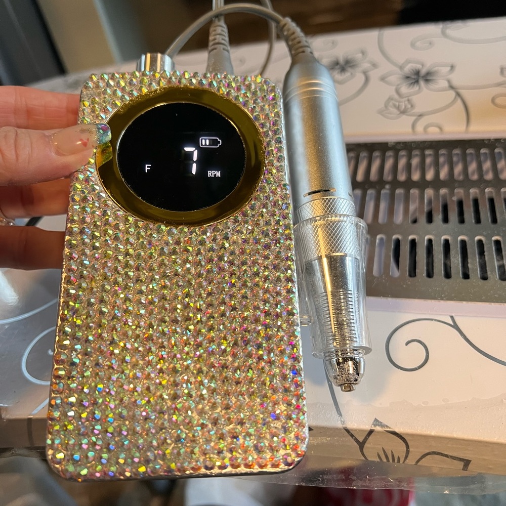 Rechargeable electric nail file